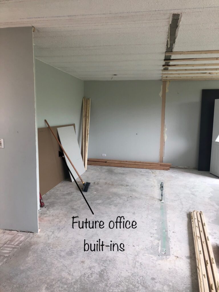 Progress Photo – View looking from the living room towards future office built-ins (where walls were removed).