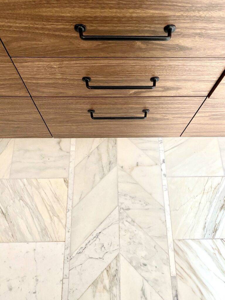I love the contrast/warmth of the walnut combined with the calacatta marble...two of my favorite things
