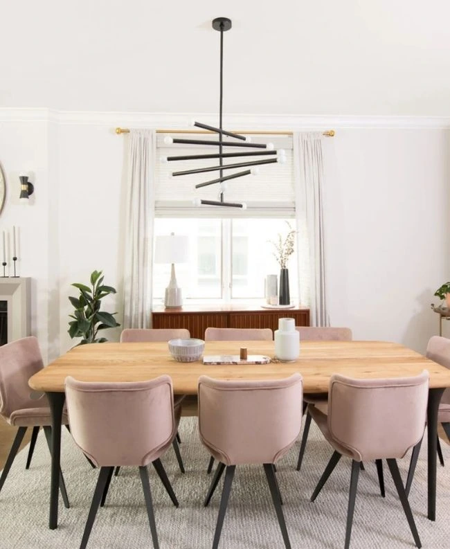 Dining room with a unique ceiling light fixture