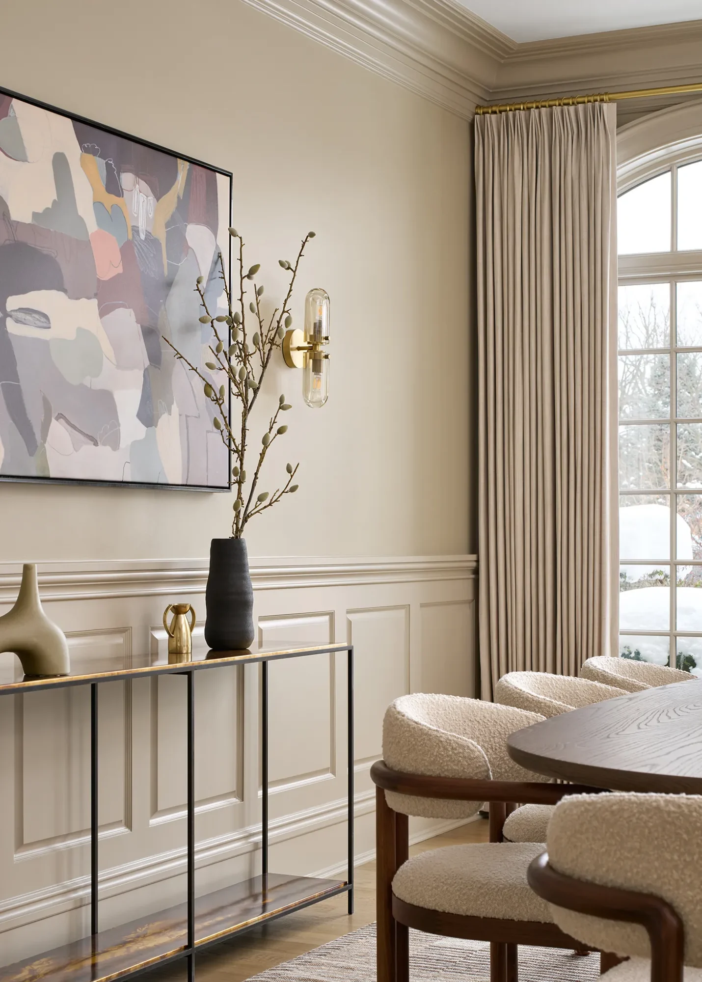 Elegant dining room with modern and classic design elements.