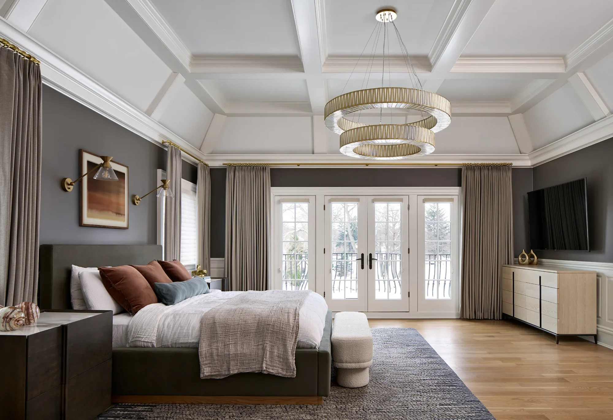 Serene bedroom with modern and classic design, featuring neutral tones and stylish furnishings.